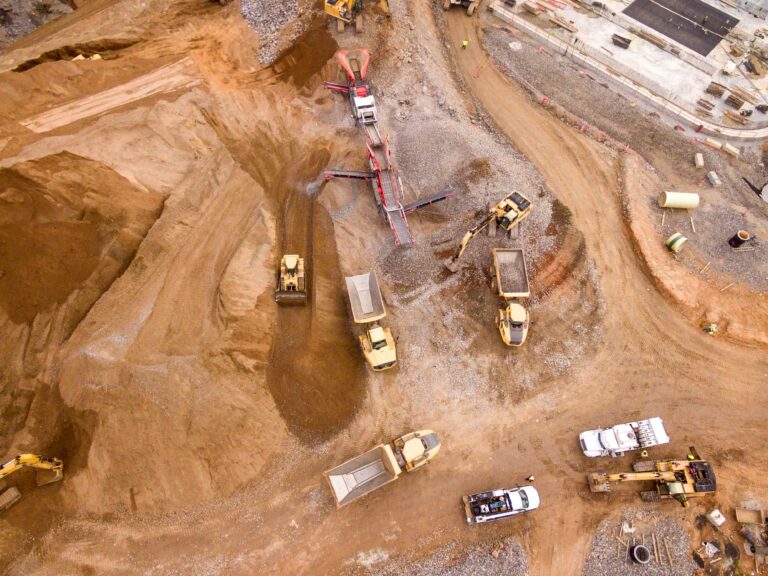 Aerial view of a construction site showing heavy construction machinery